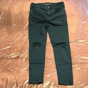 Dark green skinny jeans